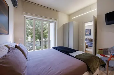 Letto o letti in una camera di Betty Florence charming modern apartment near Piazza della Libertà