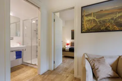 Letto o letti in una camera di Betty Florence charming modern apartment near Piazza della Libertà