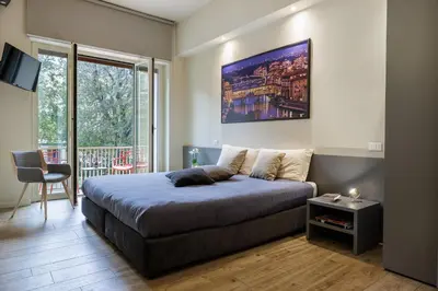Letto o letti in una camera di Betty Florence charming modern apartment near Piazza della Libertà