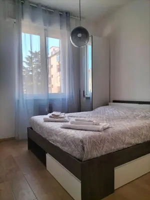 Letto o letti in una camera di Dolce Far Niente