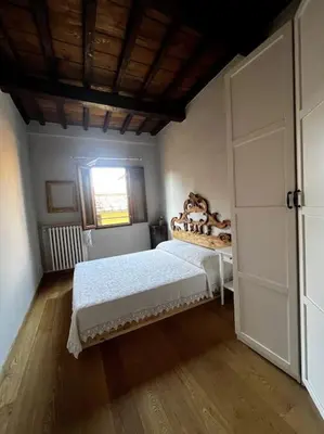 Letto o letti in una camera di Over the roofs of Florence - Tornabuoni - Duomo - Repubblica