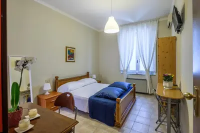Letto o letti in una camera di Hotel Firenze 2000