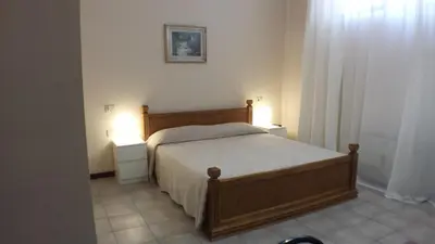 Letto o letti in una camera di Hotel Firenze 2000