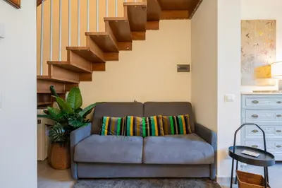 Area soggiorno di GuestHost - La Corte del Re - Piazza della Libertà Apartment