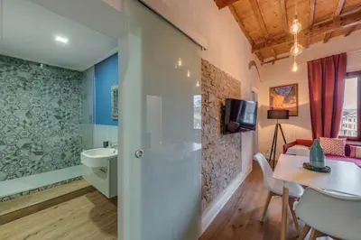 TV o dispositivi per l'intrattenimento presso Via Verdi Apartments