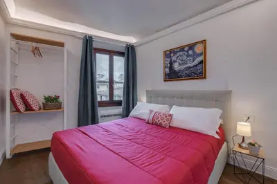Letto o letti in una camera di Via Verdi Apartments