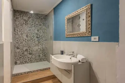 Bagno di Via Verdi Apartments