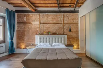 Letto o letti in una camera di Via Verdi Apartments