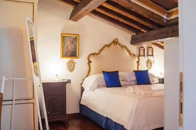 Letto o letti in una camera di Machiavelli Superior House