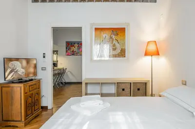 Letto o letti in una camera di GuestHost - Florence Statuto Apartment with Small Courtyard