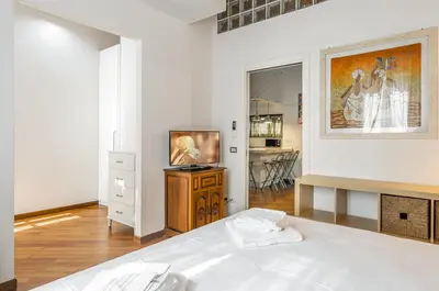 Letto o letti in una camera di GuestHost - Florence Statuto Apartment with Small Courtyard