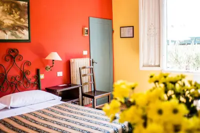 Letto o letti in una camera di Hotel Il Bargellino