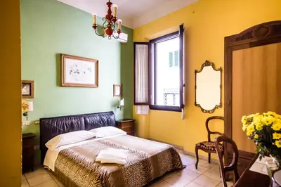 Letto o letti in una camera di Hotel Il Bargellino