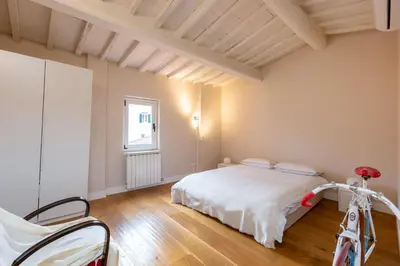 Letto o letti in una camera di Loft in Santo Spirito