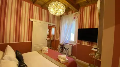 TV o dispositivi per l'intrattenimento presso Toscanella Royal Suite