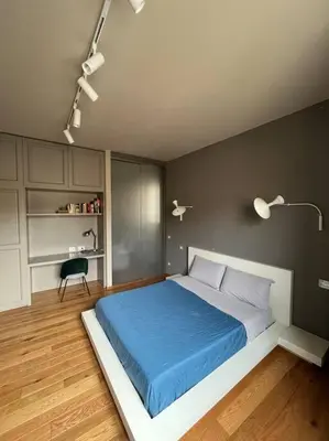 Letto o letti in una camera di New Residence on Lungarno Soderini near Ponte Vecchio
