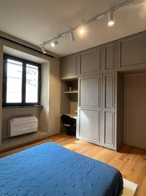 Letto o letti in una camera di New Residence on Lungarno Soderini near Ponte Vecchio