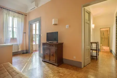 TV o dispositivi per l'intrattenimento presso Lemon Tree One Bedroom with Balcony