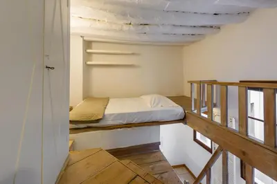 Letto o letti in una camera di Montebello Studio by Mmega