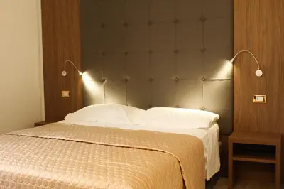 Letto o letti in una camera di LunArt