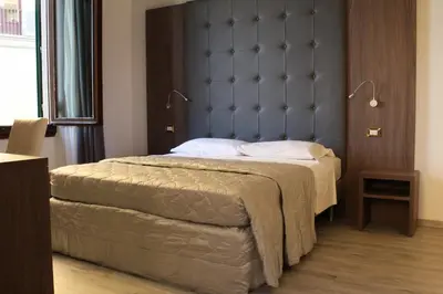 Letto o letti in una camera di LunArt