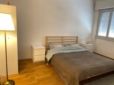 Letto o letti in una camera di B&B Royal Prato