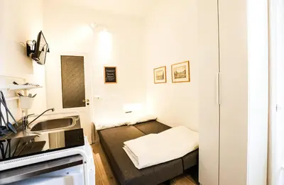 Letto o letti in una camera di Raffaello studio flat