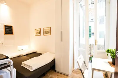 Letto o letti in una camera di Raffaello studio flat