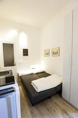 Letto o letti in una camera di Raffaello studio flat