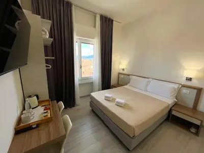 Letto o letti in una camera di Affittacamere Sunset House