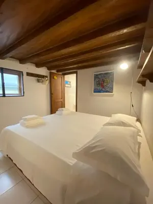 Letto o letti in una camera di Piccola stanza al Duomo