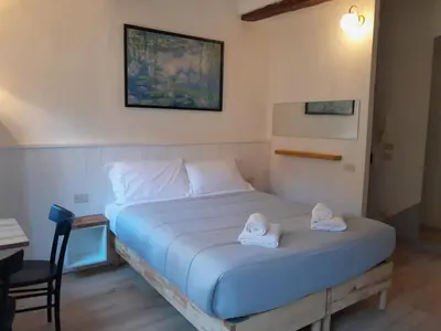 Letto o letti in una camera di Casa Dei Bianchi
