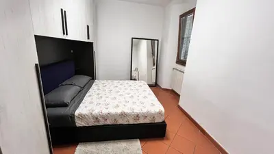 Letto o letti in una camera di Casa Maria