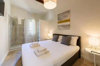Letto o letti in una camera di Novella Contemporary Apartment by Mmega