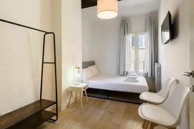 Letto o letti in una camera di Novella Contemporary Apartment by Mmega