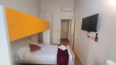 Letto o letti in una camera di Il Fiorino di Santa Croce