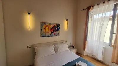 Letto o letti in una camera di Il Fiorino di Santa Croce