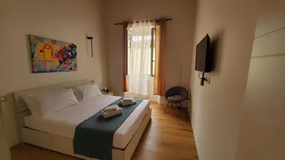 Letto o letti in una camera di Il Fiorino di Santa Croce