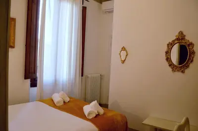 Letto o letti in una camera di Florence Heart B&B