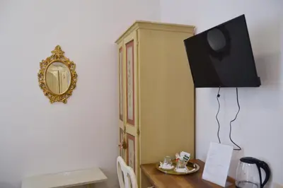 TV o dispositivi per l'intrattenimento presso Florence Heart B&B