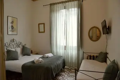 Letto o letti in una camera di Florence Heart B&B