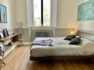 Letto o letti in una camera di Dandy Suite on the Arno River