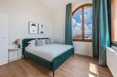 Letto o letti in una camera di Apartments Florence- Borgo Pinti Panorama