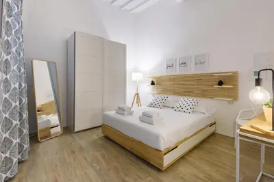 Letto o letti in una camera di Madame Betta by Mmega