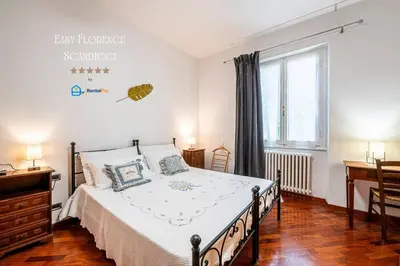 Letto o letti in una camera di Easy Florence Scandicci