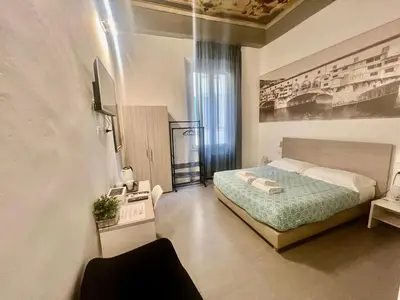 Letto o letti in una camera di Sant Antonino First Floor Relais