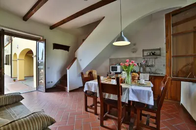 Area soggiorno di Fattoria Pagnana Suites & Pool