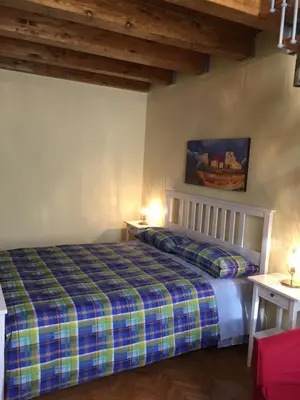Letto o letti in una camera di LA CASA DI ORSOLA