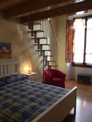 Letto o letti in una camera di LA CASA DI ORSOLA