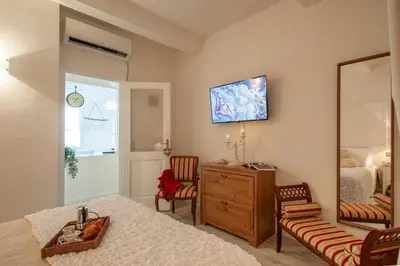 TV o dispositivi per l'intrattenimento presso Sweet Pergola - Flo Apartments